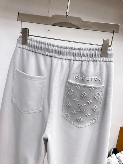 Debossed Logo Seam Stitching Pants