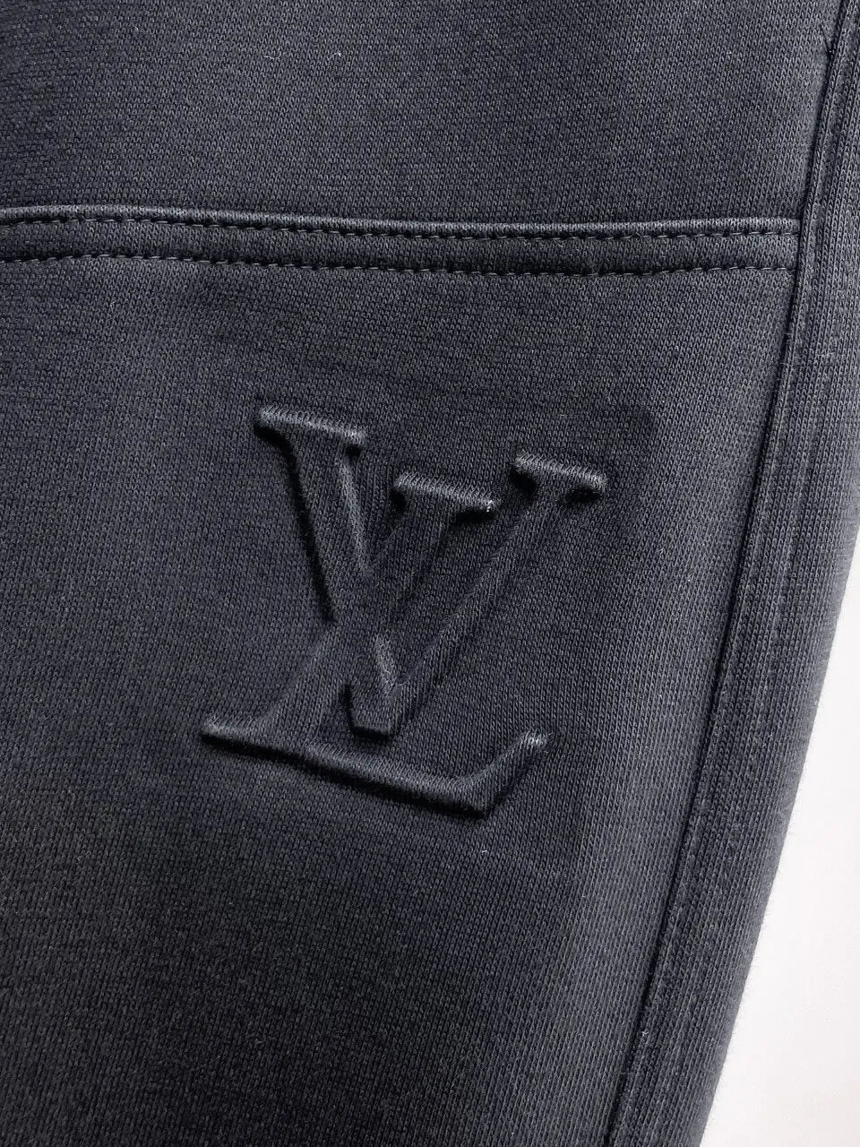 Debossed Logo Seam Stitching Pants