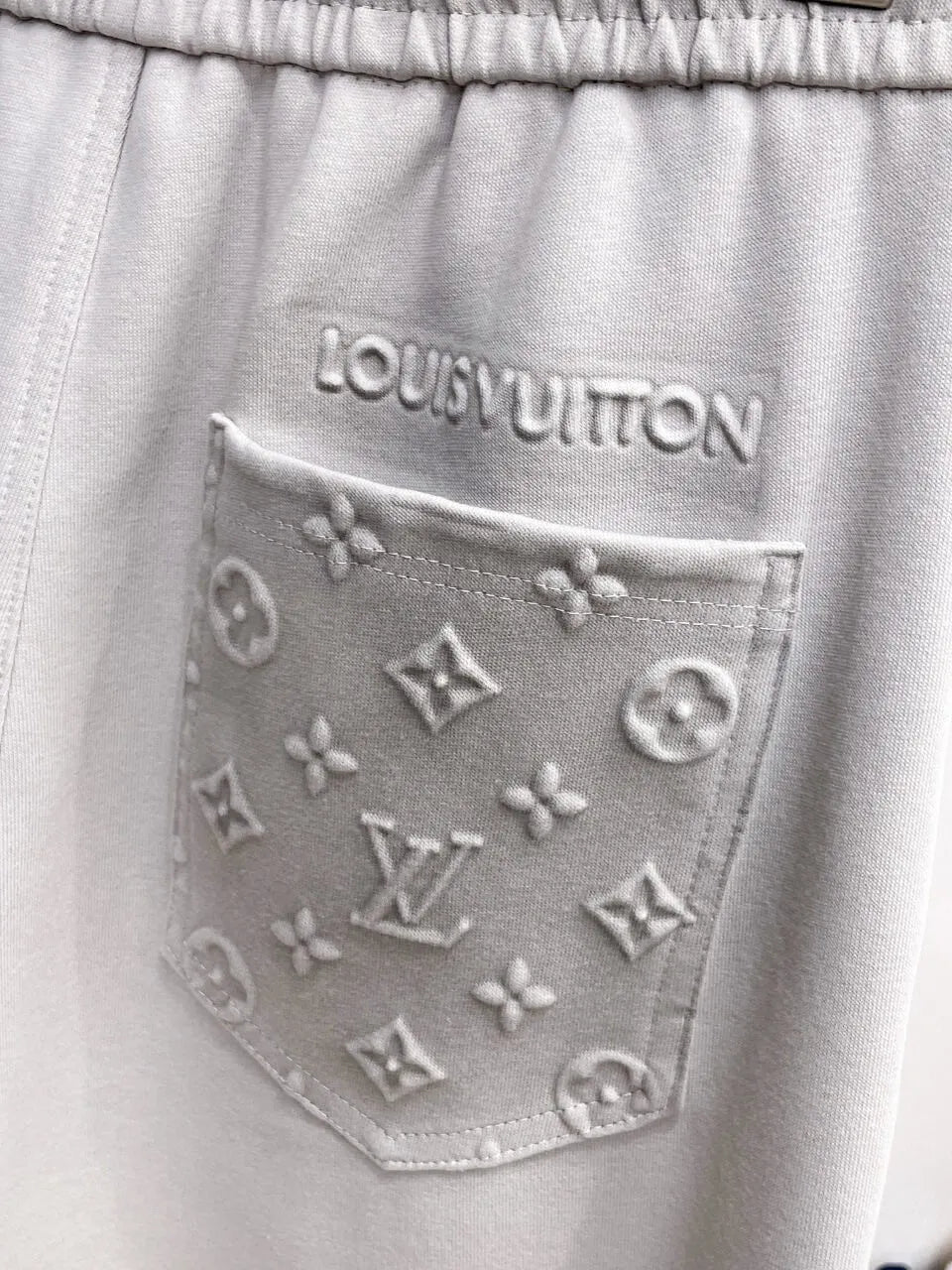 Debossed Logo Seam Stitching Pants